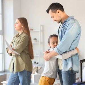 Parents with a child in the middle, illustrating the complexities of Child Custody Decisions